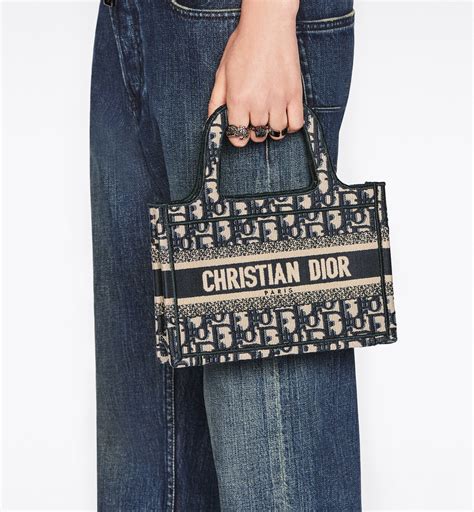 blue dior oblique embroidered mini dior book tote price|christian dior embroidery style.